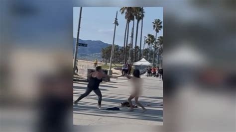 naked lady fight|Nude woman swings spiked club in fight at Venice Beach .